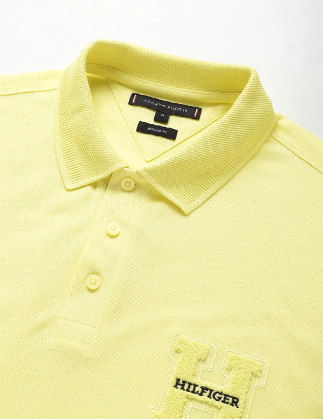 I love this TOMMY HILFIGER Monogram Transitional Cotton Polo Shirt at NNNOW
